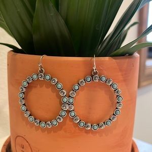 Cute earrings fake turquoise hoops!! Worn once just to big for myself!